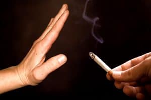Hand gesture of turning down a cigarette